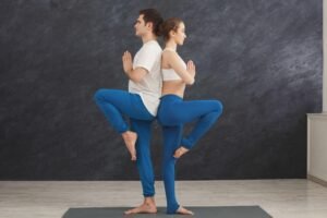 Partner yoga stretch pose for beginners at home
